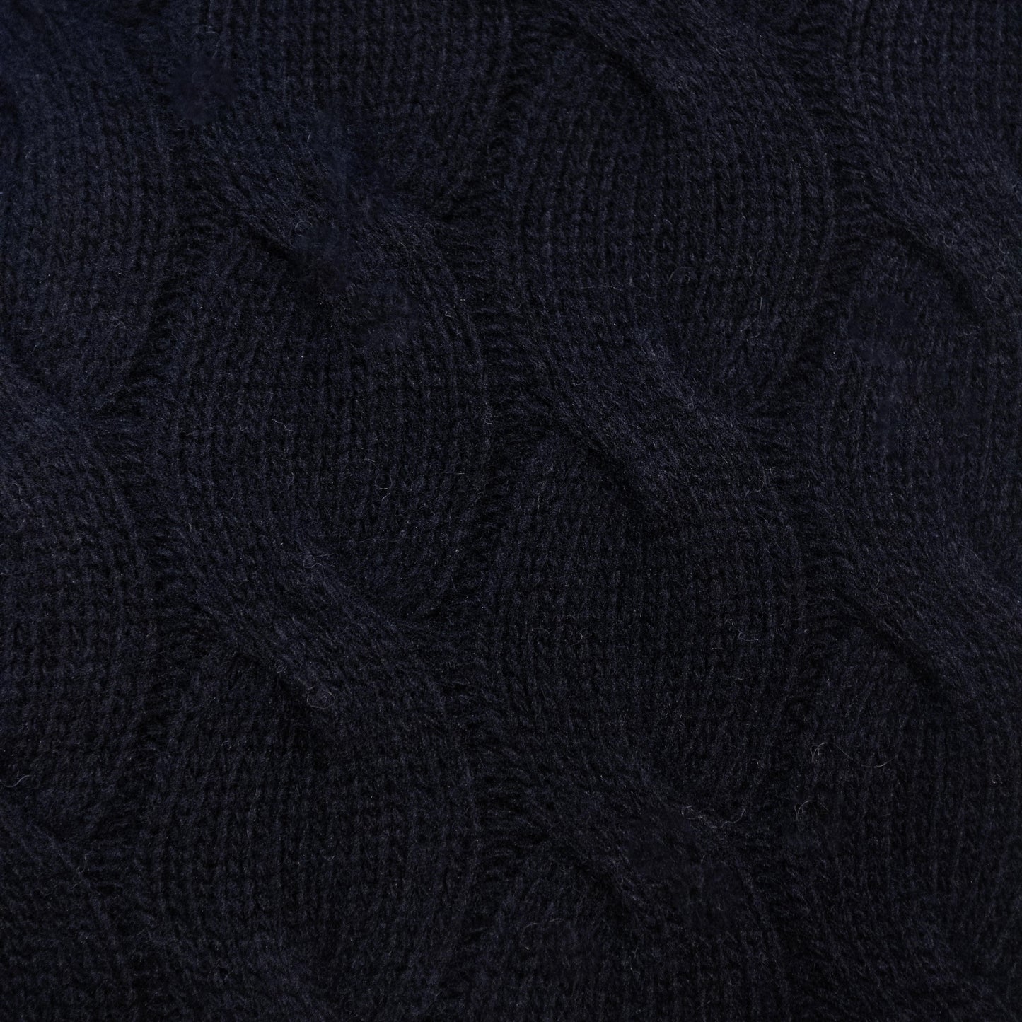 Maglia dolcevita a trecce